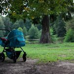 Baby stroller in a calm park setting