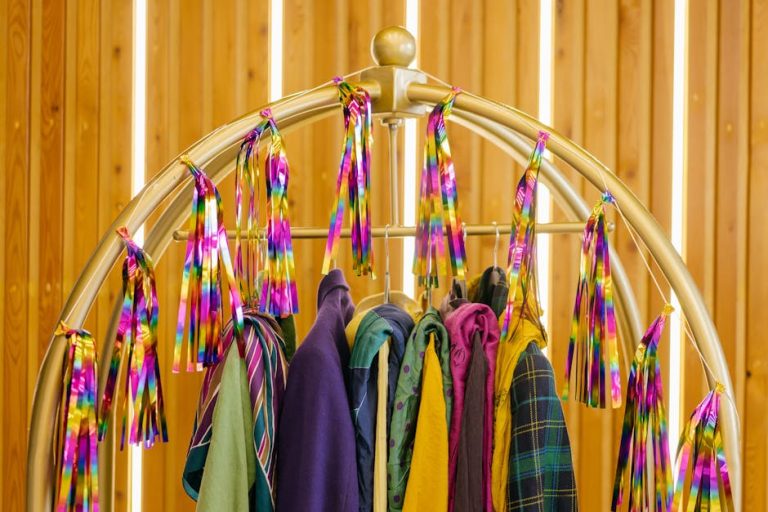 Colorful fashion pieces arranged on a clothing rack