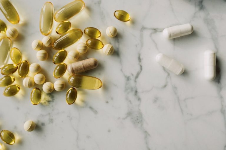 Vitamins and supplements arranged on a clean counter