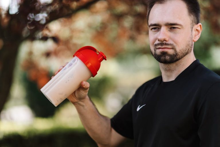 Protein shake and shaker bottle ready after a workout