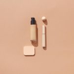 Neutral makeup products arranged for a Fenty Beauty sale shopping guide